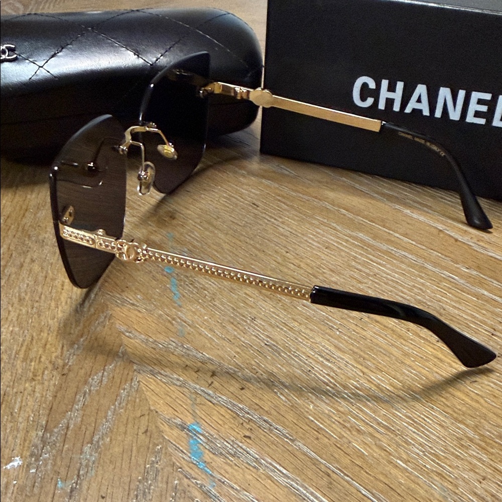 CHANEL Black Rimless Square Sunglasses with Gold Accents - Picture 5 of 9